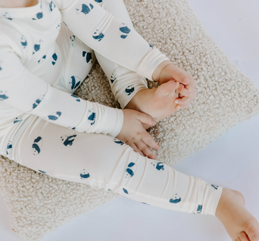 Little boy wearing toddler modal pajama set-in panda print